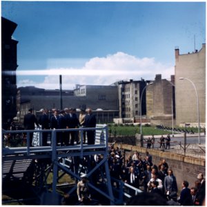 President's Trip to Europe- President mounts platform overlooking Berlin Wall. President Kennedy, others in party... - NARA - 194226