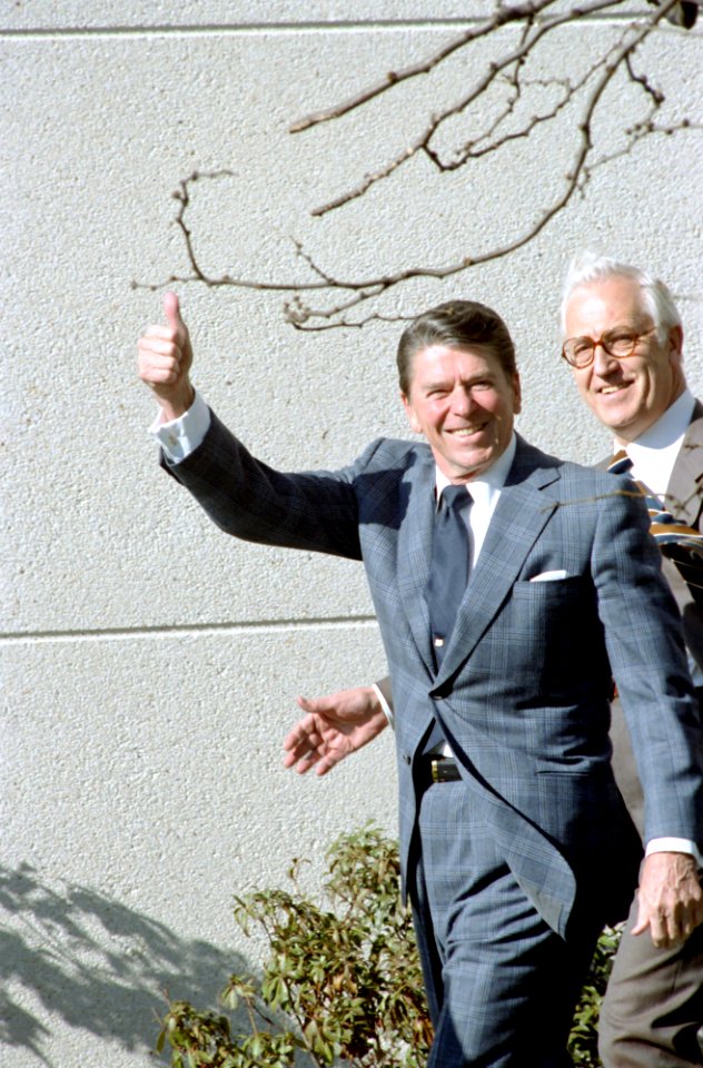 President Ronald Reagan giving the thumbs up sign outside Bethesda Naval Medical Center in Maryland
