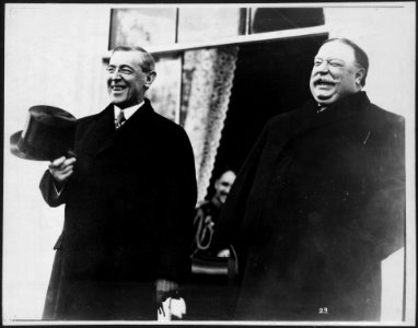 President-elect Wilson and President Taft, standing side by side, laughing, at the White House, prior to Wilson's inauguration ceremonies, March 4, 1913 LCCN00650962