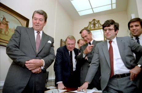 President Ronald Reagan watching the Tax Bill vote with staff in the White House photo