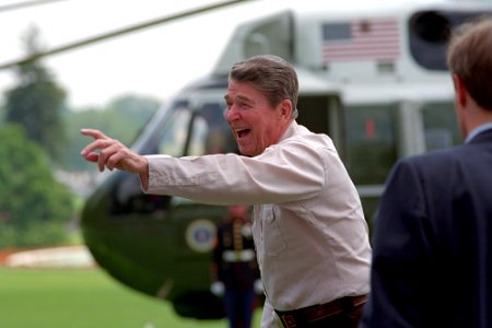 President Ronald Reagan waving prior to his departure via Marine One for Camp David on the South Lawn
