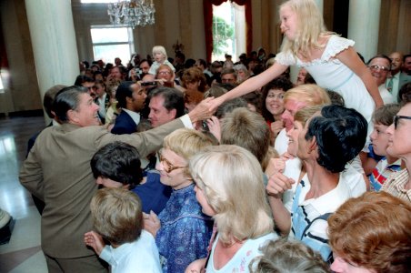 President Ronald Reagan Greeting Tourists at White House photo