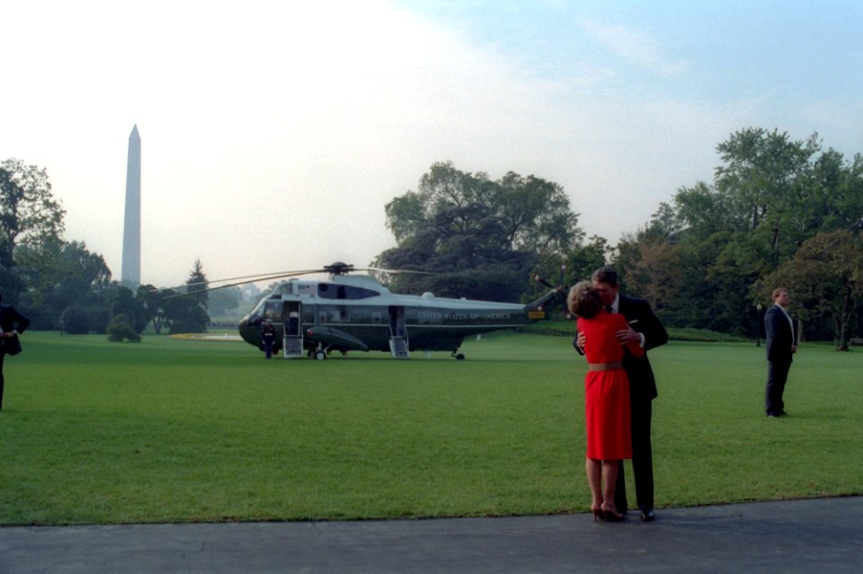 President Ronald Reagan kissing Nancy Reagan goodbye