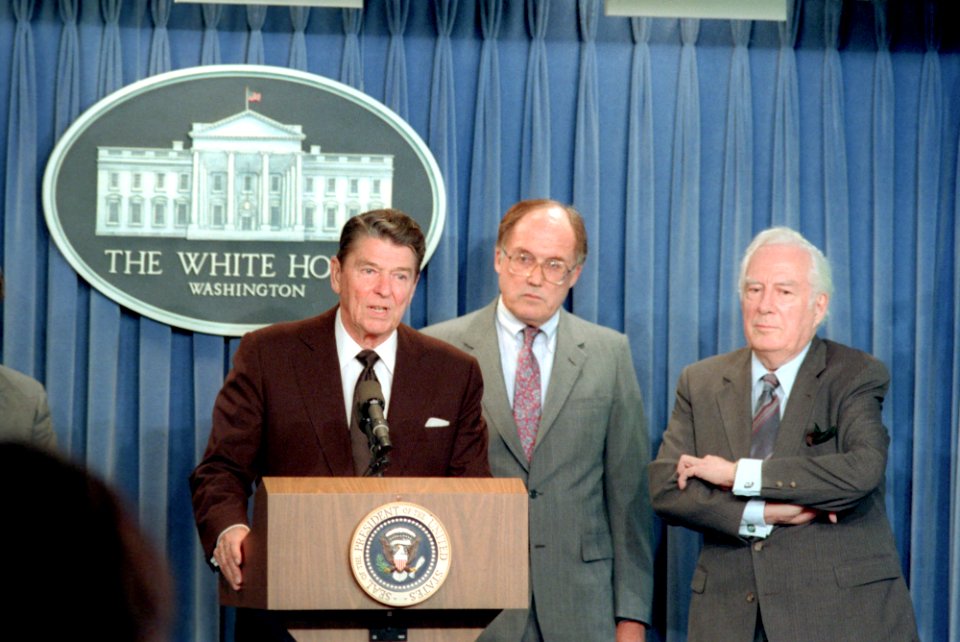 President Ronald Reagan with William Rehnquist and Warren Burger