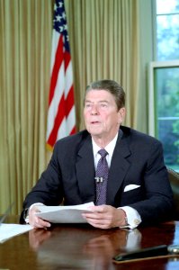 President Ronald Reagan making an address to the nation on tax reform in Oval Office photo