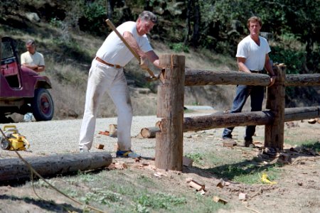 President Ronald Reagan working on a fence with Dennis LeBlanc at Rancho Del Cielo in Santa Barbara, California