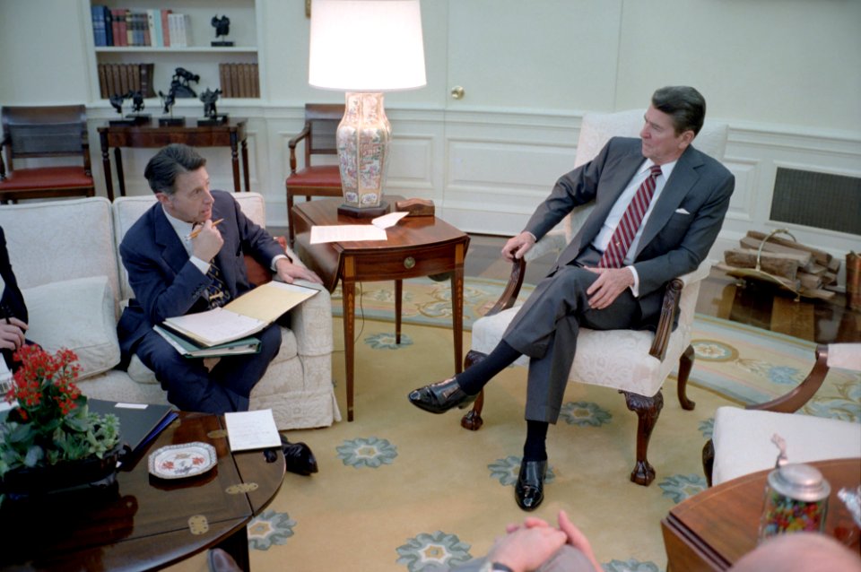 President Ronald Reagan meeting to discuss the 1984 Budget of the United States with Caspar Weinberger