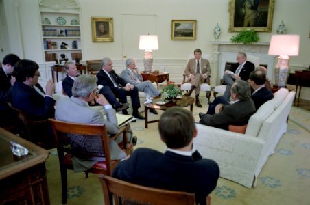President Ronald Reagan meeting with bipartisan Congressional leaders in the Oval Office photo