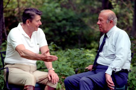 President Ronald Reagan meeting with George Shultz