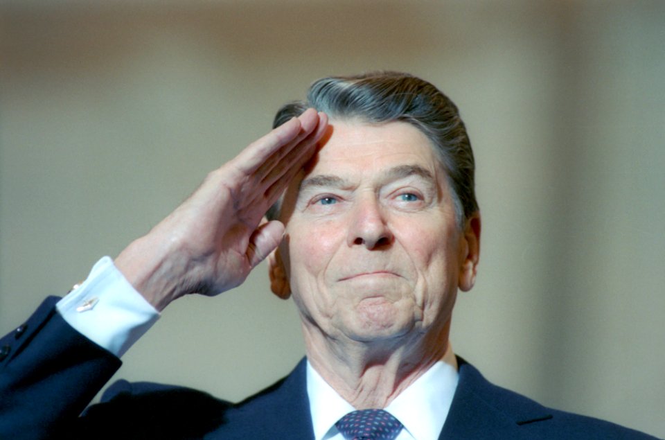 President Ronald Reagan salutes during an Armed Forces Salute