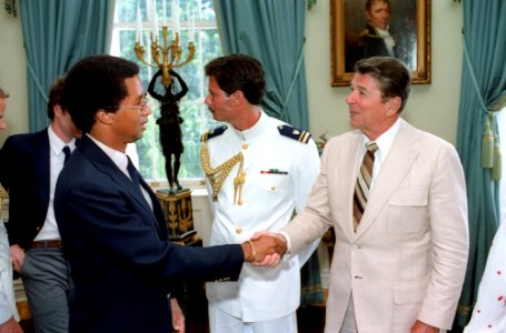 President Ronald Reagan shaking hands with Arthur Ashe