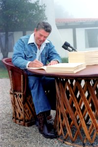 President Ronald Reagan Signs the 1981 Economic Recovery Tax Act and Omnibus Budget Reconciliation Act at Rancho Del Cielo in California