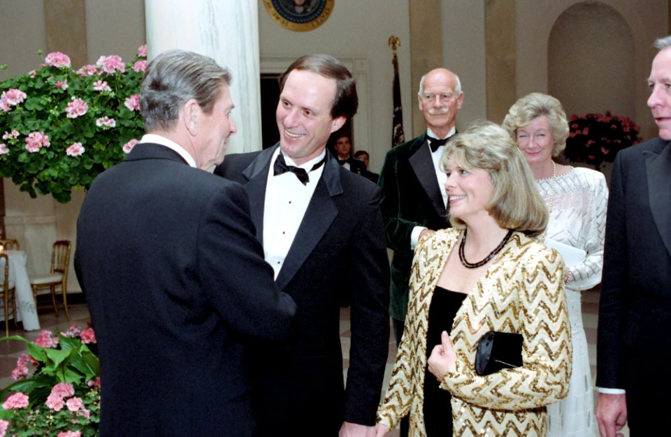 President Ronald Reagan speaking with Dr. Robert Ballard and Marjorie Ballard in the White House