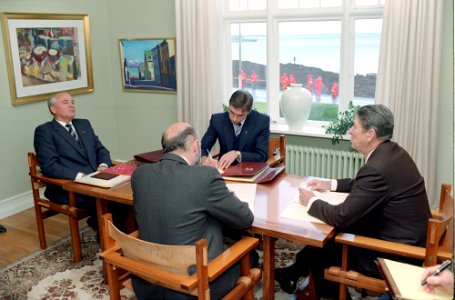 President Ronald Reagan talking to Mikhail Gorbachev during a meeting at the Reykjavik Summit photo
