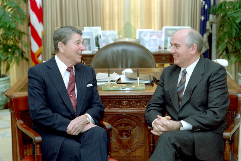 President Ronald Reagan talks with Mikhail Gorbachev in the Oval Office during the Washington Summit