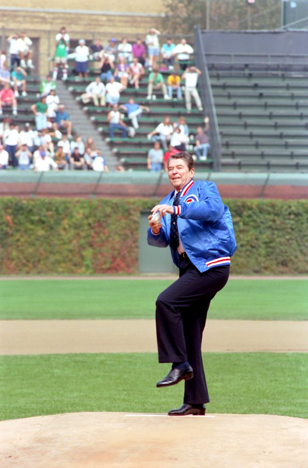 President Ronald Reagan throwing out the first pitch at a baseball game between the Chicago Cubs and Pittsburgh Pirates