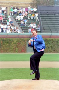 President Ronald Reagan throwing out the first pitch at a baseball game between the Chicago Cubs and Pittsburgh Pirates