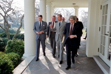 President Ronald Reagan walking with senior staff