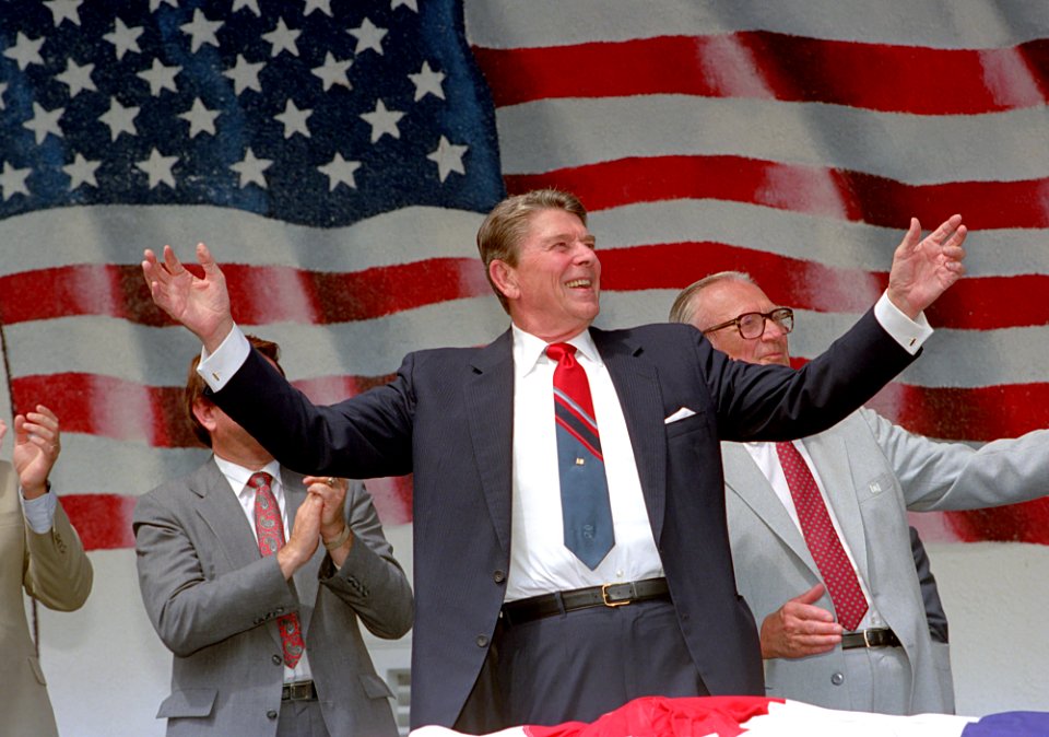 President Ronald Reagan waving to the crowd during a trip to Port Washington, Wisconsin
