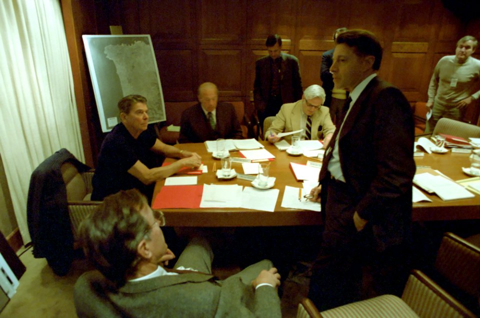 President Ronald Reagan with Caspar Weinberger, George H. W. Bush and George Shultz in a National Security Planning Group Meeting in the Situation Room
