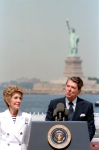 President Ronald Reagan with Nancy Reagan giving speech on the Centennial of the Statue of Liberty Governor's Island New York