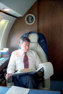 President Ronald Reagan working in his state room on a trip to France