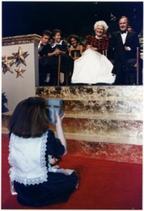 President-elect and Mrs. Bush have their picture taken by their granddaughter, Barbara Bush, at the Inaugural Gala on... - NARA - 186371