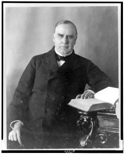 President William McKinley, half-length portrait, seated at desk, facing front LCCN97511127 photo