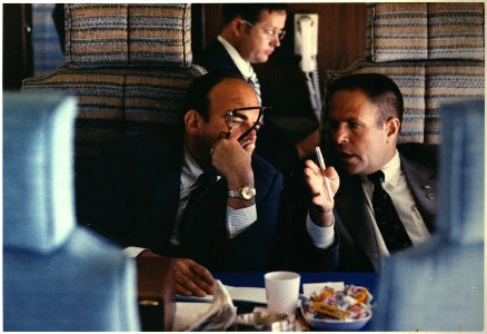 Presidential advisers, H.R. Haldeman and John D. Ehrlichman discuss policy aboard Air Force One over the Mississippi... - NARA - 194506