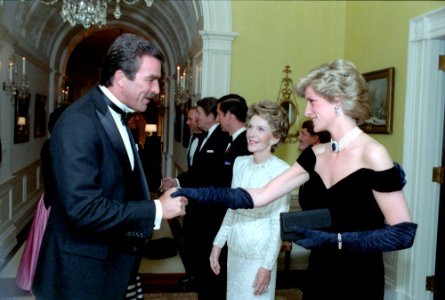 Princess Diana is greeted by Tom Selleck photo