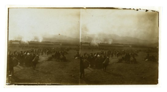 Prisoners of war waiting for trains - watching burning of abandoned stores - Port Arthur LCCN2005678613