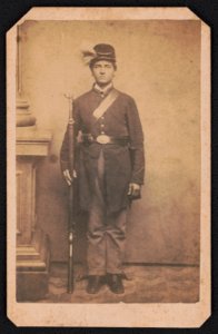 Private Franklin W. Lehman of Co. C, 149th Pennsylvania Infantry Regiment (Bucktails) and 18th U.S. Veteran Reserve Corps Infantry Regiment, in uniform with musket in hand and bucktail on LCCN2017659633
