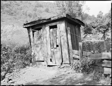 Privy for miner's family, tenants of apartment which was formerly a store in building., formerly owned by coal mining... - NARA - 541178 photo