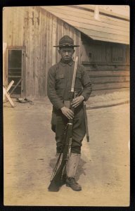 Private John H. Rowe of Co. B, 16th Infantry Regiment in uniform with bayoneted rifle LCCN2018645954