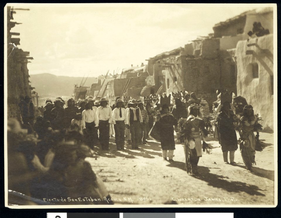 Procession leaving the church during the Fiesta de San Esteban (Saint Stephen), Acoma Pueblo, ca.1886 (CHS-46722)