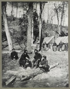 Prof. Mailefert and naval officers at the torpedo station on the James River LCCN2013647458