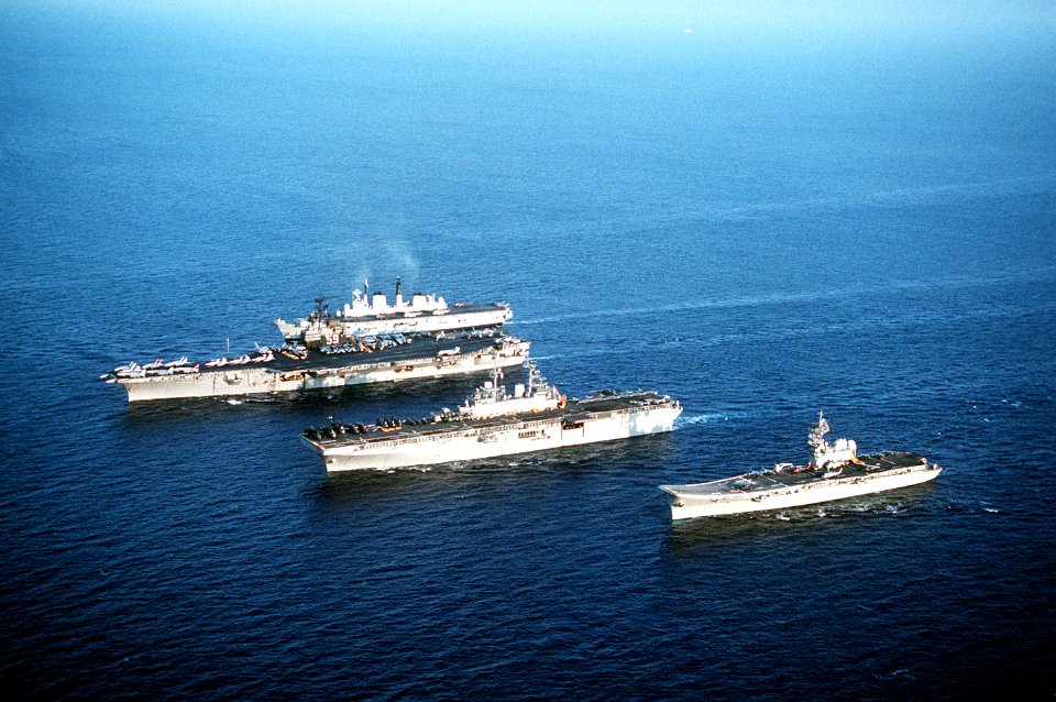 Principe de Asturias (R11), USS Wasp (LHD-1), USS Forrestal (CV-59) and HMS Invincible (R05) underway in October 1991
