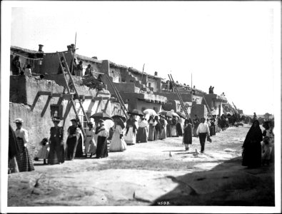 Procession of Mexican and Indian women during the Fiesta de San Esteban (Saint Stephen), Acoma Pueblo, ca.1900 (CHS-4508)