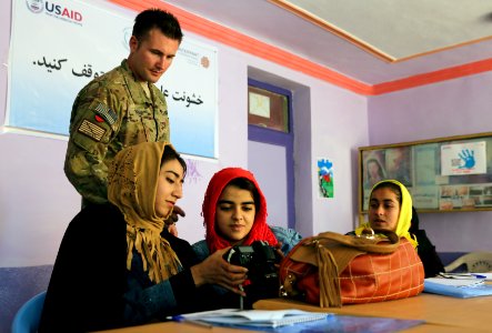 PRT Farah conducts photojournalism training in Farah City 130210-N-IE116-189