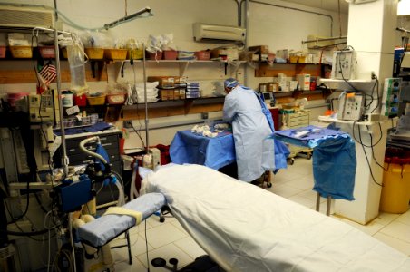 PRT Farah medical team, 541st Forward Surgical Team and coalition medics treat Afghan National Police 121231-N-LR347-262