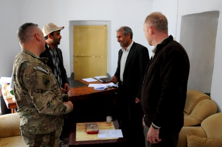 PRT Farah meets with Director of Repatriation and Refugees in Farah City 130122-N-LR347-004