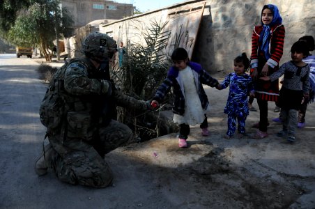 PRT Farah meets with Director of Repatriation and Refugees in Farah City 130122-N-LR347-165