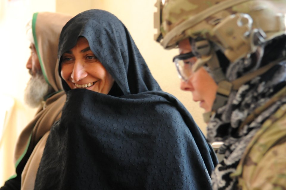 PRT Farah visits Children's Supplemental Feeding Center in Farah City 130119-N-LR347-280