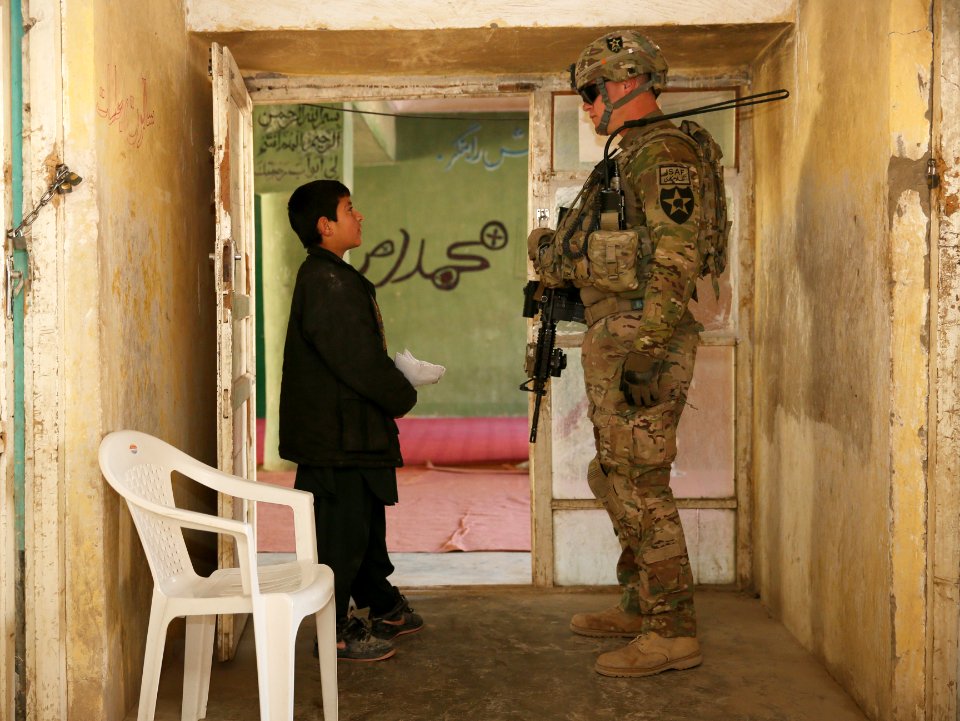 PRT Farah delivers school supplies in Farah City 121229-N-IE116-105