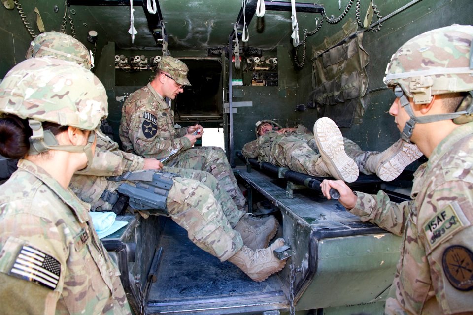PRT Farah medics and corpsmen sharpen their medical skills 121130-N-IE116-005