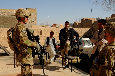 PRT Farah meets with Director of Repatriation and Refugees in Farah City 130122-N-LR347-207