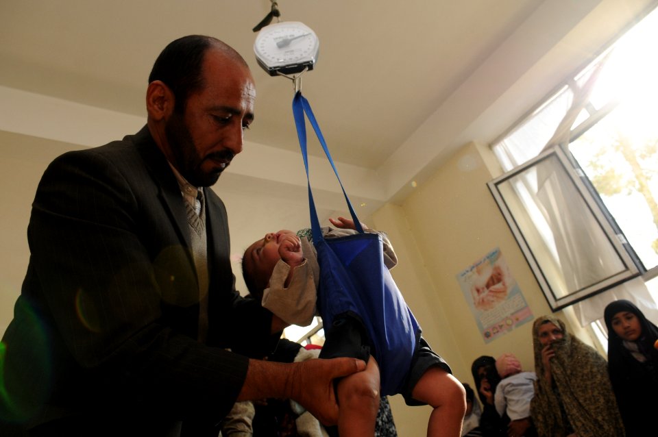 PRT Farah visits children's supplemental feeding center at Farah City hospital 121222-N-LR347-125