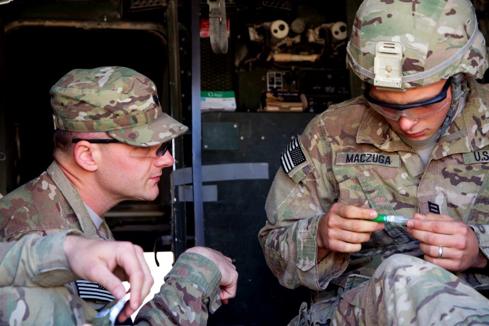 PRT Farah medics and corpsmen sharpen their medical skills 121130-N-IE116-007