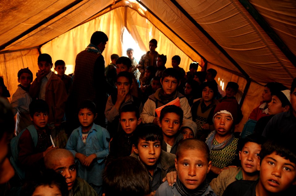 PRT Farah visits local returnee and refugee village 130209-N-LR347-270