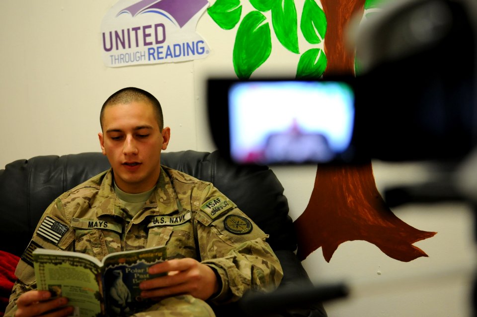 PRT Farah Completes United Through Reading Read-a-thon 130118-N-LR347-049